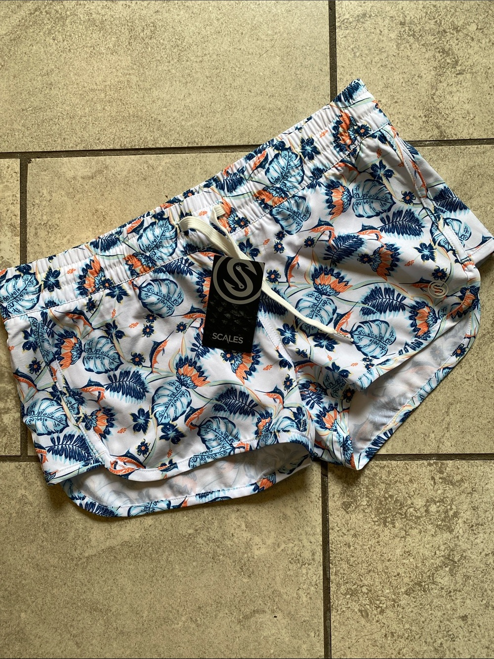 SCALES Tropic Star White Floral Boars Shorts with Blue and Orange Print
